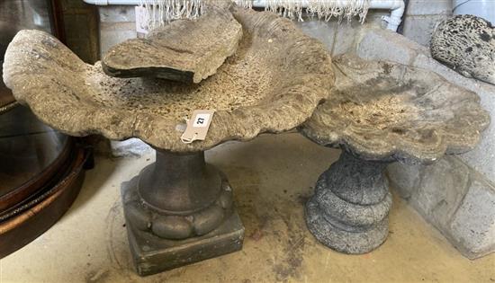 Two reconstituted stone bird baths (one in need of repair), largest diameter 65cm